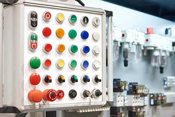 Display case featuring pneumatic components, buttons, switches and controls used in industrial automation