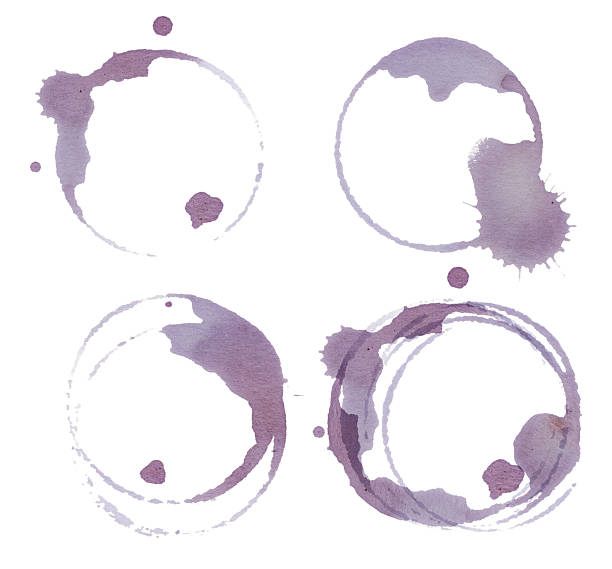 istock Wine stains and glass ring marks on white background. Real red vine glass stains set. Glass stamps. Artistic grape juice spill texture for food and drink design 2244726442