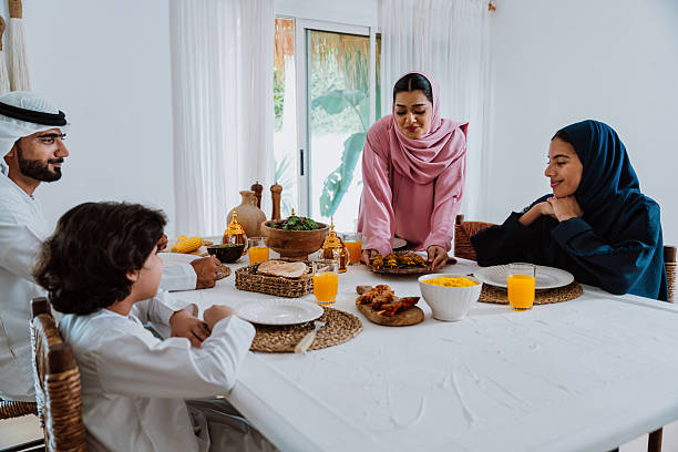 istock Emirati muslim family dining together during ramadan 2244729713