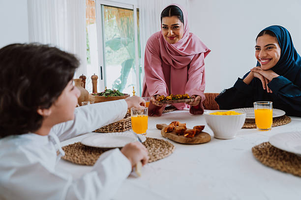 istock Emirati muslim family dining together during ramadan 2244729748