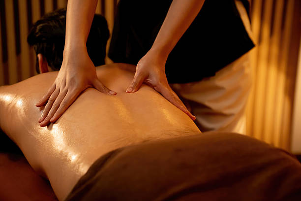 istock Caucasian man customer enjoying relaxing anti-stress massage. Quiescent 2244729749