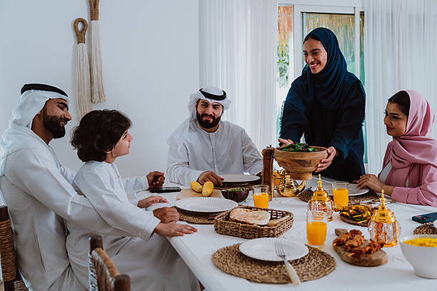 istock Emirati muslim family dining together during ramadan 2244730415