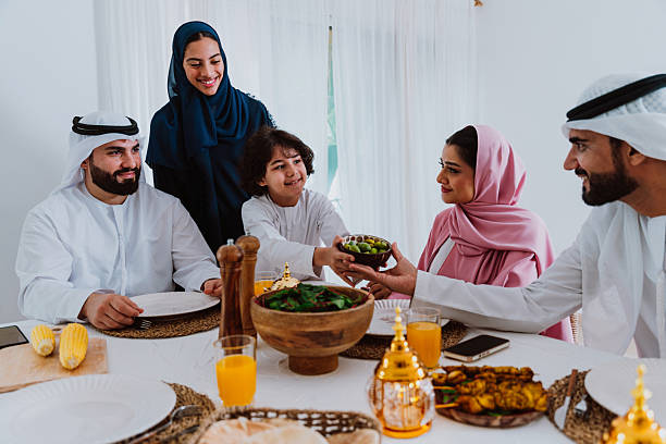 istock Emirati muslim family dining together during ramadan 2244730528