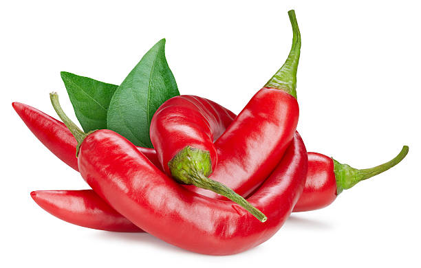 Cayenne pepper with leaves clipping path. Red hot chili pepper isolated on white background