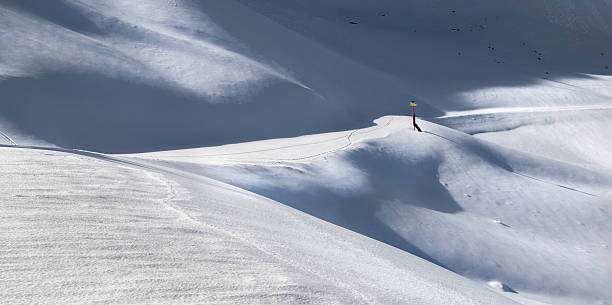 istock view on freshly snow-covered and delicate shadows on the immaculate snow on ski slope in snowy  mountain in alpine ski resort 2244734532