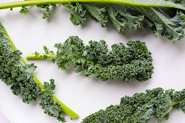 istock Curly kale leaves, Fresh green vegetables 2244736366