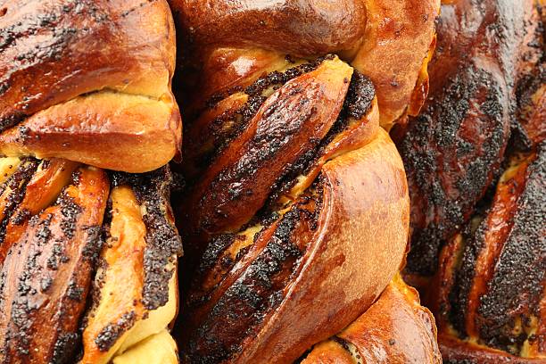 istock Tasty buns with poppy seeds as background, closeup 2244738821