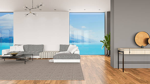 Modern Living Room Interior with Panoramic Windows and Beautiful Sea View
