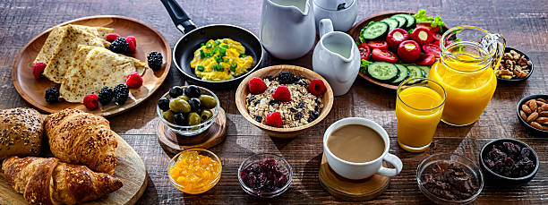 istock Breakfast served with coffee, eggs, cereals and croissants 2244741959