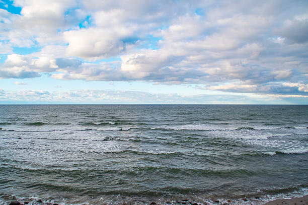 Empty sea to the horizon. Light light of the setting sun.
