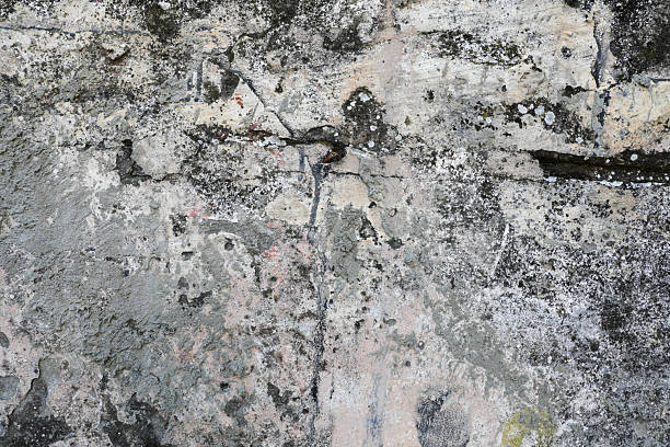 istock Vintage Wall With Cracks And Peeling Plaster 2244745154