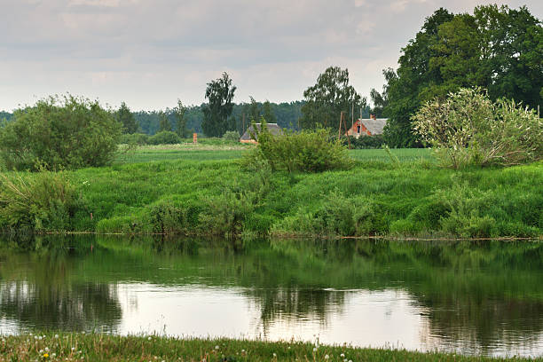 istock Country landscape by river in Latvia. 2244745264