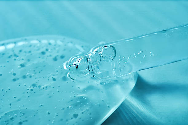 istock Serum in a pipette on a blue ribbed background. 2244745618
