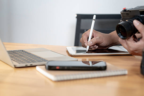istock Freelance photographer editing photos on computer at home office 2244745816