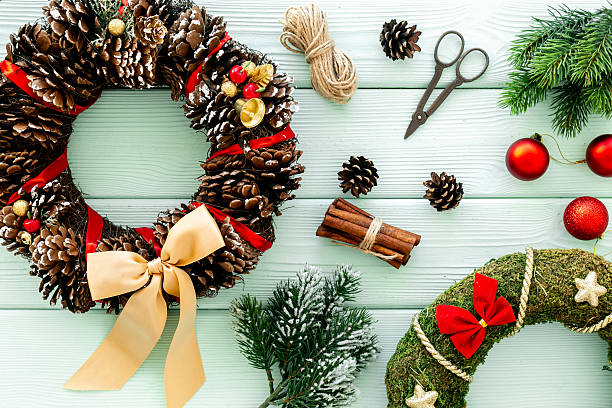 istock New Year DIY decoration - Christmas wreath with accessories, top view 2244745861
