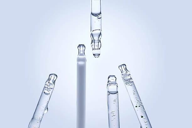 istock Five different droppers with facial serum. 2244746120