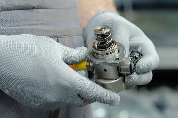 istock Car service.Repair of the engine fuel system. 2244750473