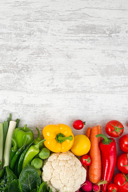 istock Fresh Vegetables on White Wooden Table 2244750877