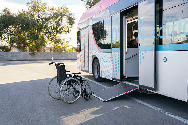 istock Wheelchair and access ramp extended from public bus 2244754404