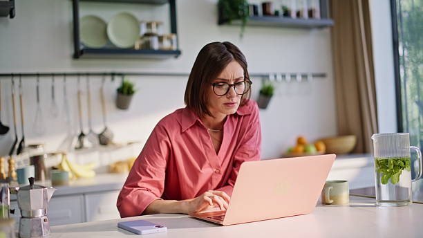 istock Tired freelancer working home office closeup. Businesswoman closing computer 2244755082