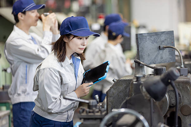 Group of Asian people working in a factory