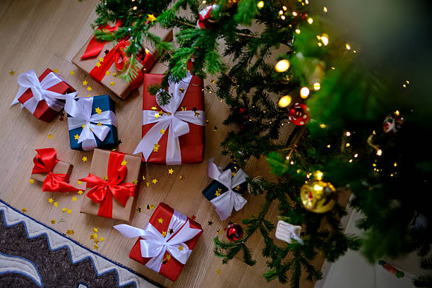 istock Lots of Christmas presents under the decorated Christmas tree. 2244758276