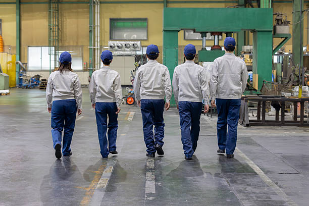 Group of Asian people working in a factory
