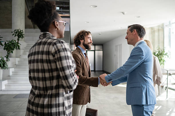 istock Business professionals shaking hands completing successful agreement 2244763423