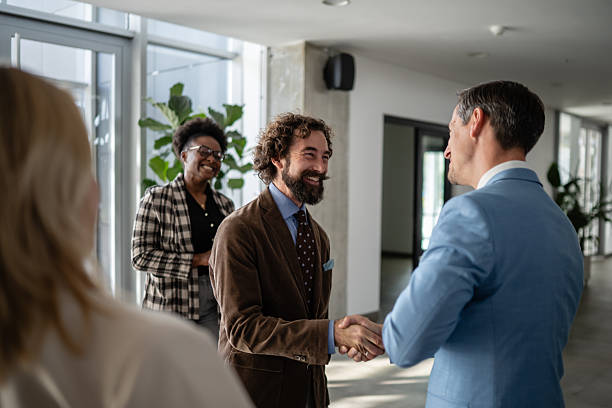 istock Business people shaking hands celebrating agreement 2244763773