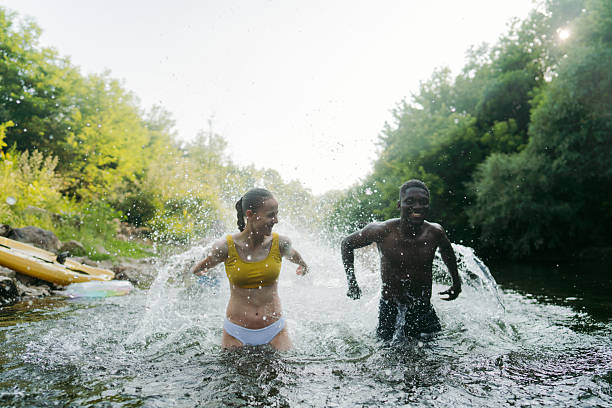 istock Refreshing in the river on a hot summer day 2244763907