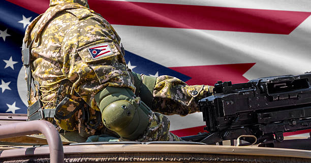 istock Ohio US state flag with soldier at machinegun turret 2244765802