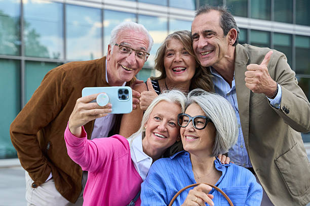 istock Senior friends smiling making selfie with smartphone 2244766509