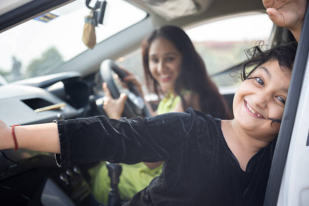istock Joyful Mother And Daughter In Car Smiling. 2244771546