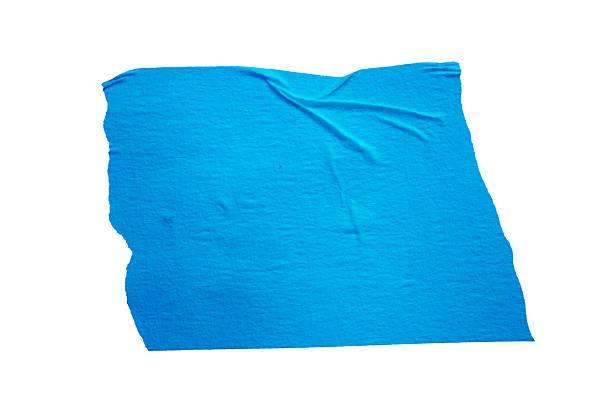 Ripped torn paper adhesive blue masking tape isolated on white background