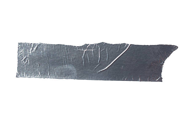 istock Ripped torn sticky aluminum foil tape isolated 2244771898