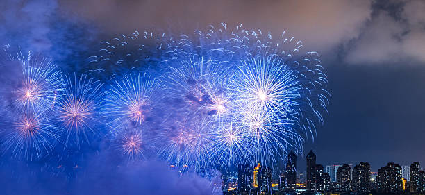 City skyline at night with fireworks