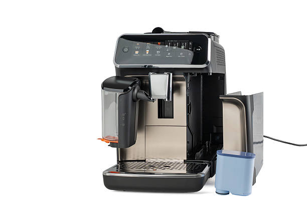 Front-angled view of the coffee maker with open water tank compartment.