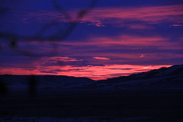 istock Sunrises and moonrises over the valley. 2244779425