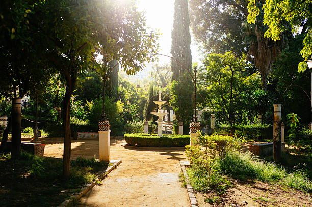 A public park with a fountain in Seville, Spain.