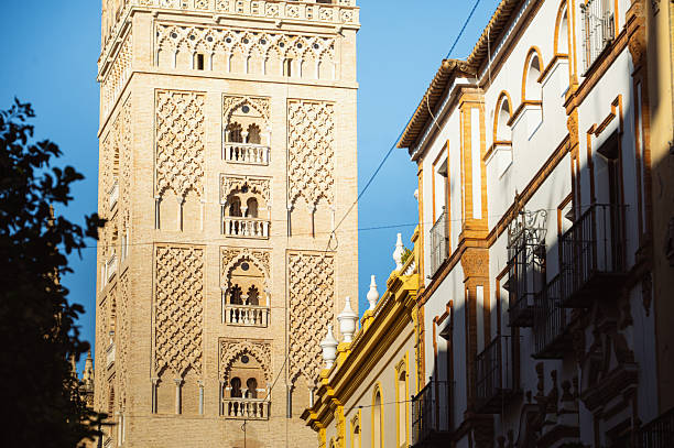La Giralda (translated to The Giralda), the beautiful bell tower of Seville's Cathedral, Spain