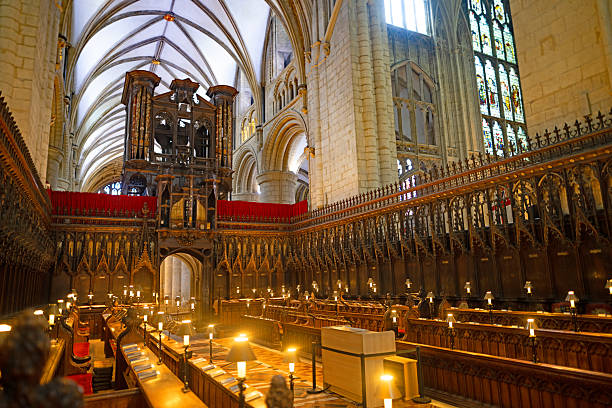 Liturgy in Grand Church: Majestic Procession Of Ministers And Priests Walking with Processional Cross. Congregation Stands In Reverence, Christians Rejoice In Ceremony of Mass