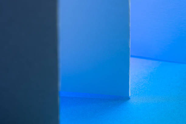 Color and glossy rollers of offset printing machine. offset ink colour.  Cyan. Photo taken horizontally, selected focus cylinder middle.