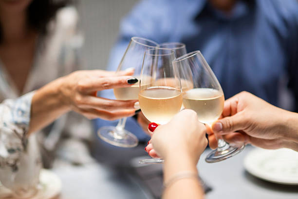 istock elegant dinner with a toast among colleagues 2244790074