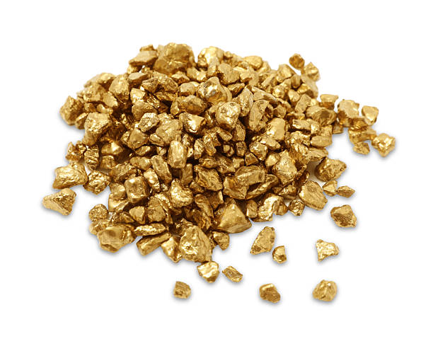 istock Heap of gold nuggets isolated on white 2244790412