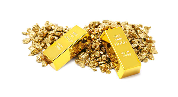 istock Gold nuggets and bars isolated on white 2244790423