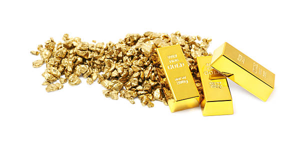 istock Gold nuggets and bars isolated on white 2244790447