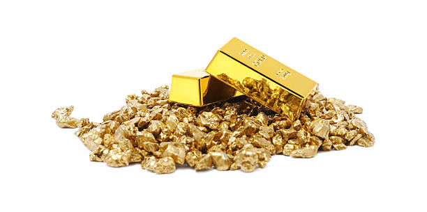 istock Gold nuggets and bars isolated on white 2244790985