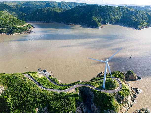 Morning drone shot of mountain top industrial wind power plant.carbon neutrality, clean energy, sustainable energy.