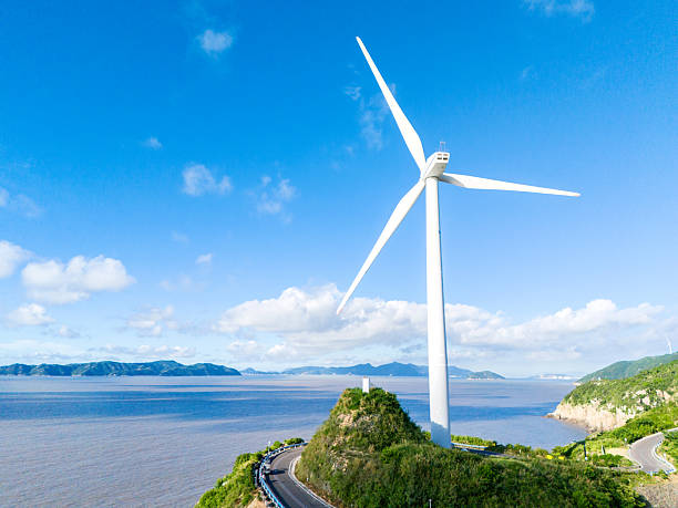 Morning drone shot of mountain top industrial wind power plant.carbon neutrality, clean energy, sustainable energy.