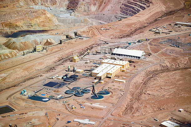 istock The immense scale of a copper mine and its processing plant in Chile, located in an arid environment with the open pit visible in the background. 2244800761